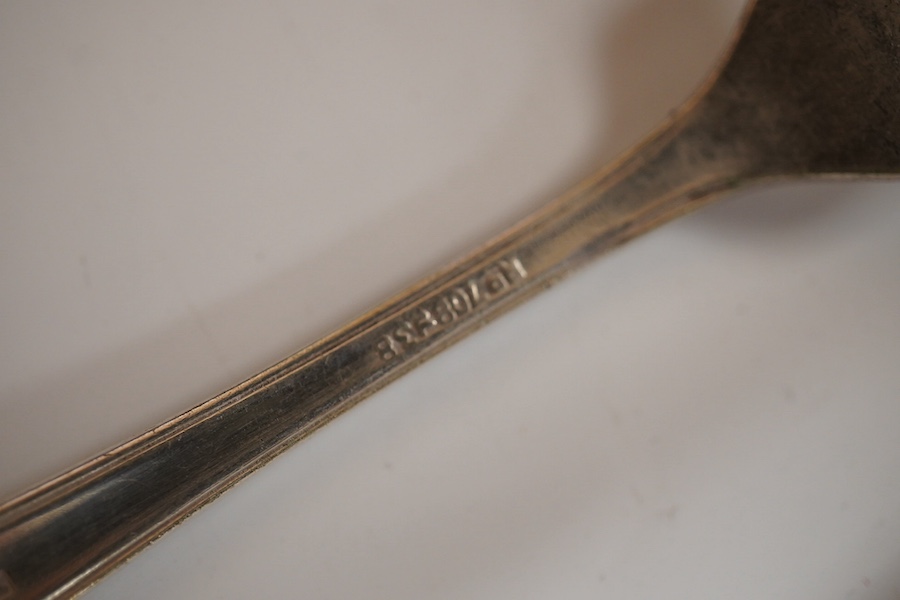 A part canteen of American sterling cutlery comprising thirty eight items, together with nine white metal handled dessert knives, nine table knives and six tea knives, all with engraved initial and a set of six silver pl